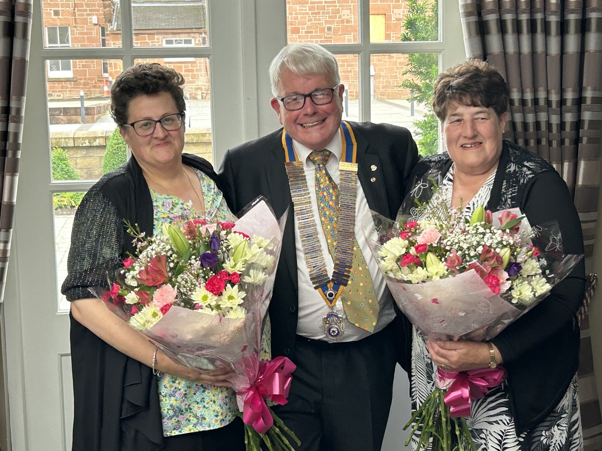 Presentation of flowers to Effie and Alison McGhee